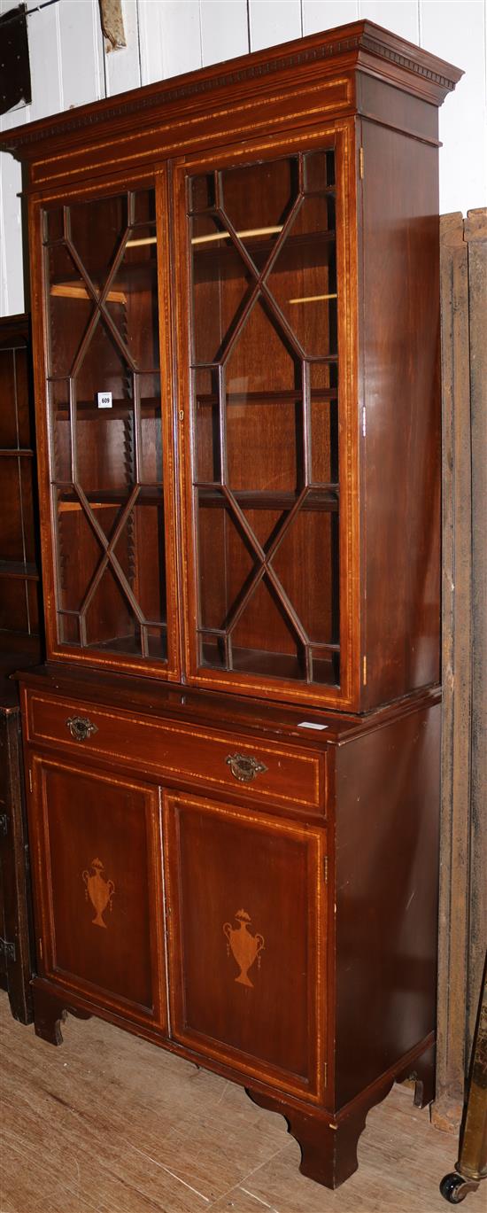 Inlaid mahogany glazed bookcase(-)